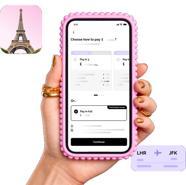 Hand holding a phone showing Vuelo's payment options, with an Eiffel Tower badge and a flight route card
